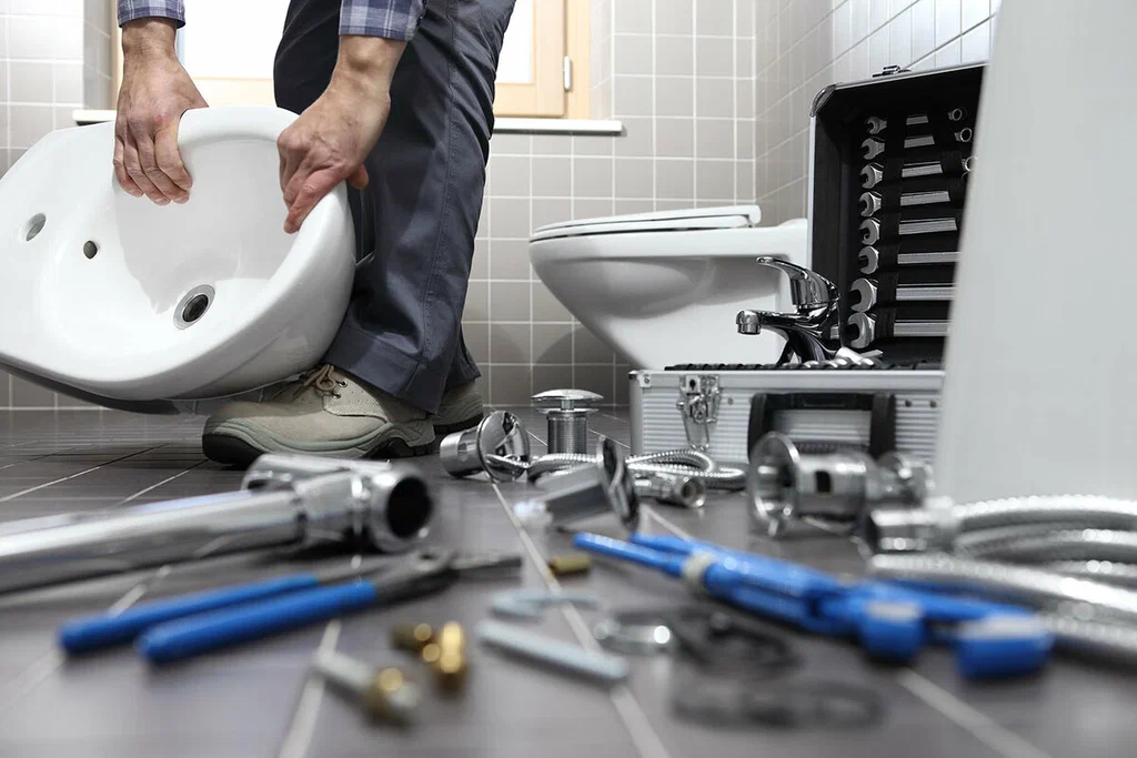 Plumbing tools prepared for a bathroom repair in Longmont